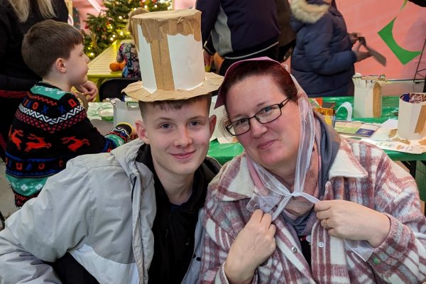 Mother and son make Victorian top hat and bonnet out of cardboard and felt